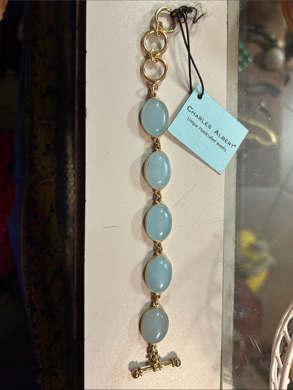Charles Albert Gold Bracelet with Pale Blue Cabochons